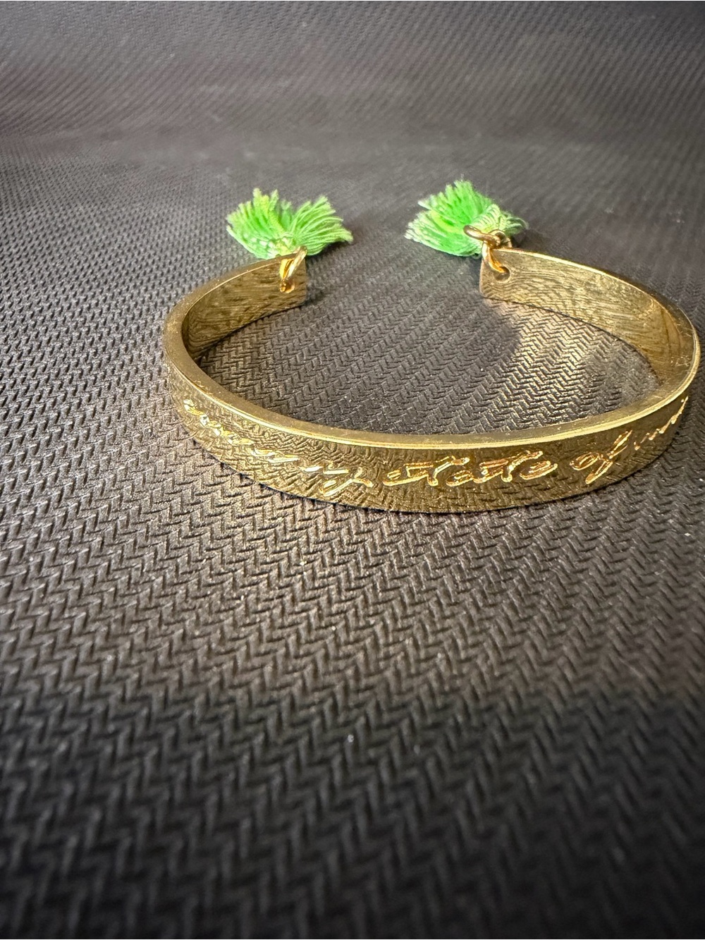 Gold-Tone Engraved Cuff Bracelet with Green Tassels